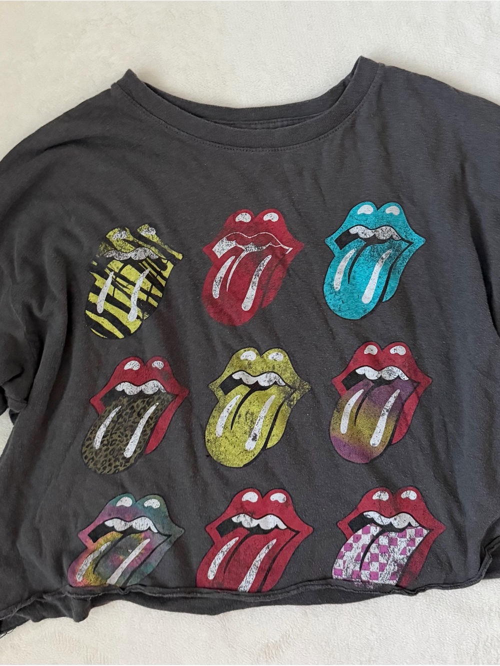 the Rolling Stones Black Crop Top with Multicolor Tongue Graphics
